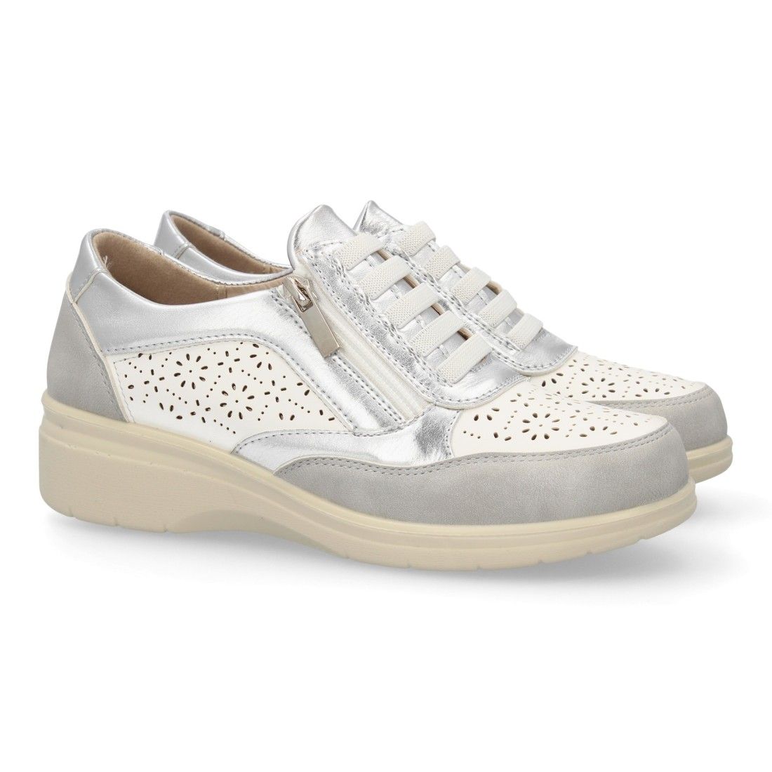 Zapatillas mujer cuña con cremallera cómodas y calados.